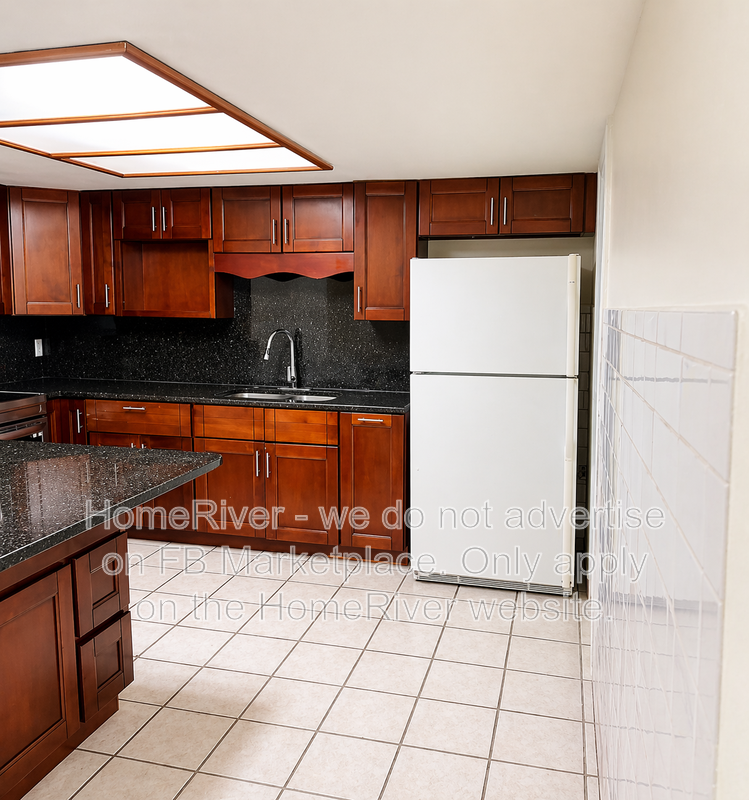 4 bedroom home with a fenced yard property image