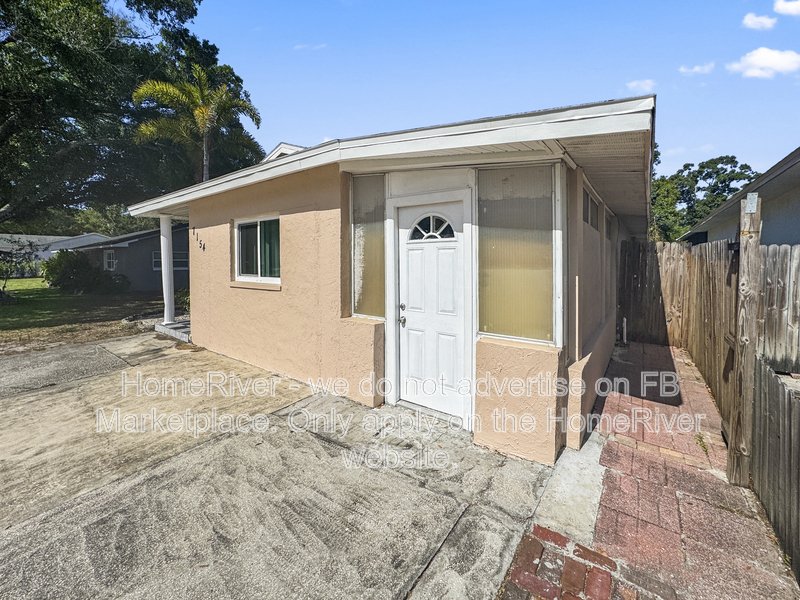 4 bedroom home with a fenced yard property image