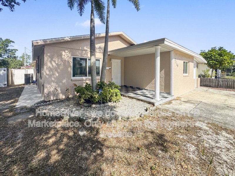 4 bedroom home with a fenced yard property image