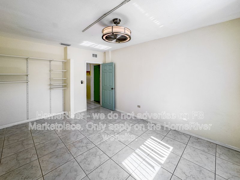 4 bedroom home with a fenced yard property image