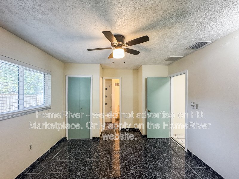 4 bedroom home with a fenced yard property image