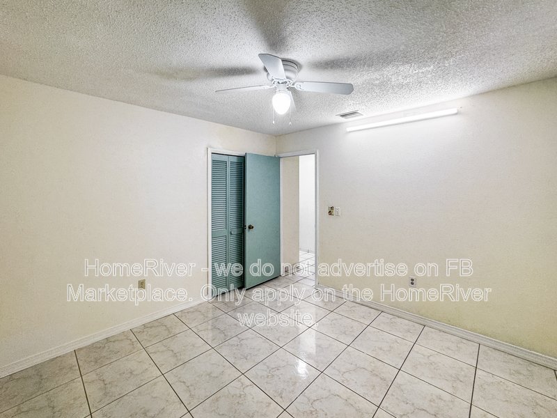 4 bedroom home with a fenced yard property image