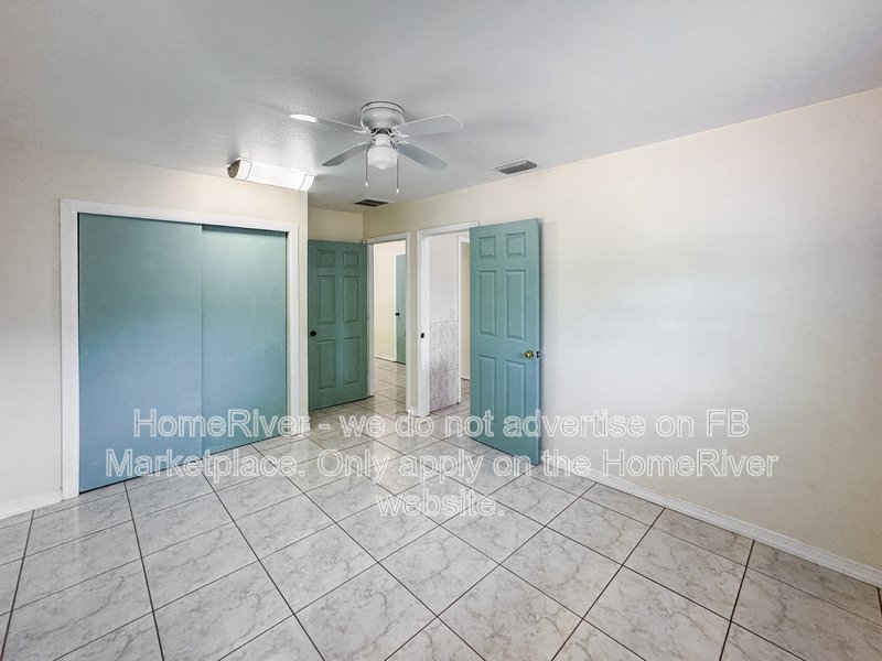 4 bedroom home with a fenced yard property image