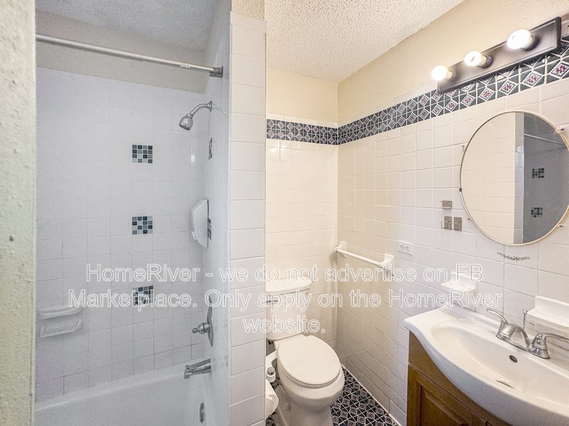 4 bedroom home with a fenced yard property image