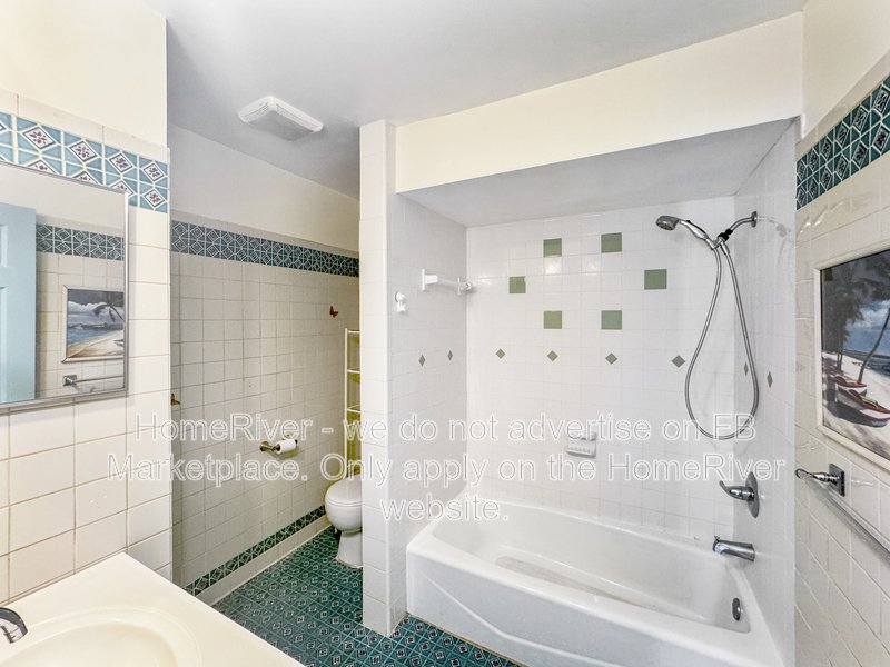 4 bedroom home with a fenced yard property image