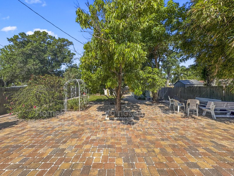 4 bedroom home with a fenced yard property image