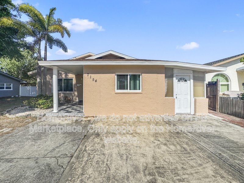 4 bedroom home with a fenced yard property image