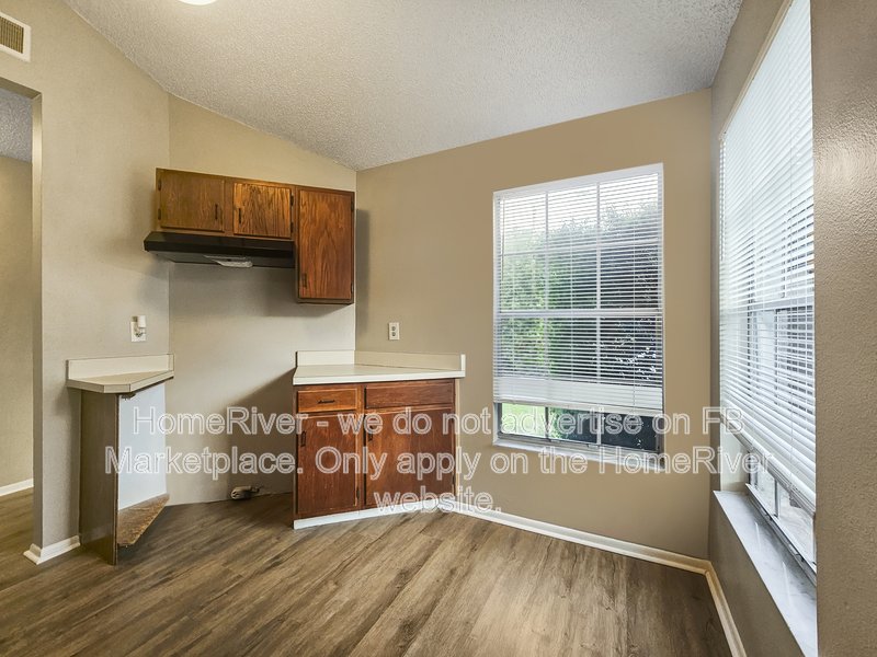 Attached Garage | Screened Porch | Private Yard | Vinyl Flooring property image