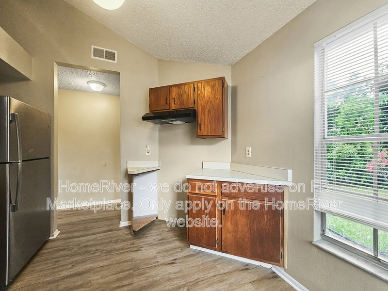 Attached Garage | Screened Porch | Private Yard | Vinyl Flooring property image