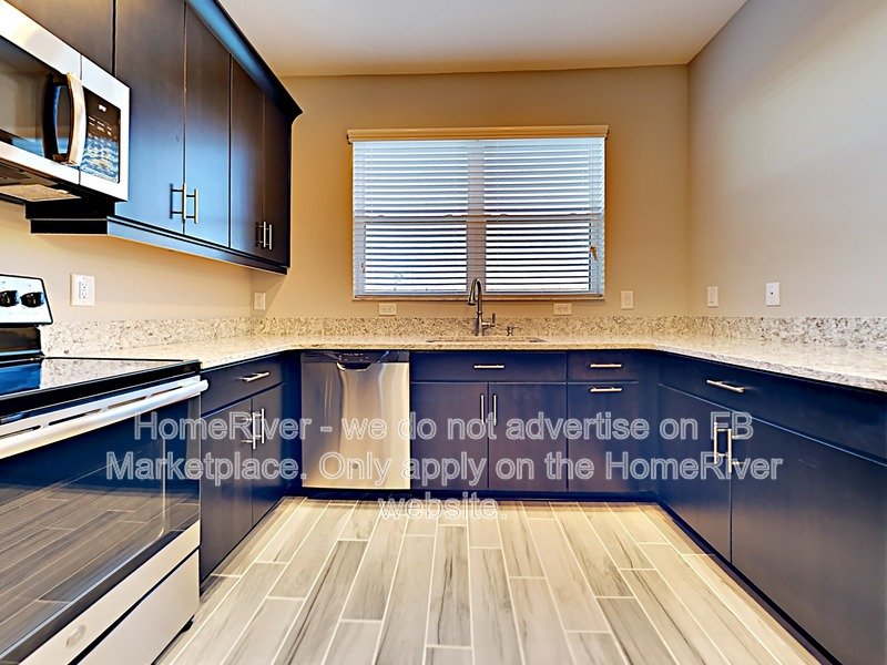 Gated Wiregrass Ranch Townhome with Pond View ? Water Included! property image