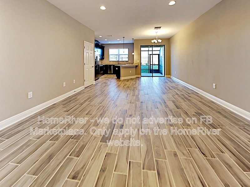 Gated Wiregrass Ranch Townhome with Pond View ? Water Included! property image