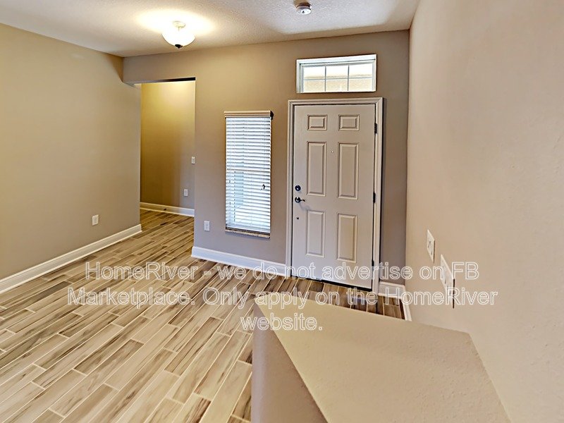 Gated Wiregrass Ranch Townhome with Pond View ? Water Included! property image
