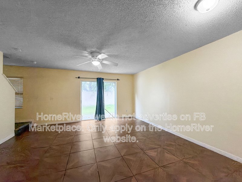Townhome with a garage property image