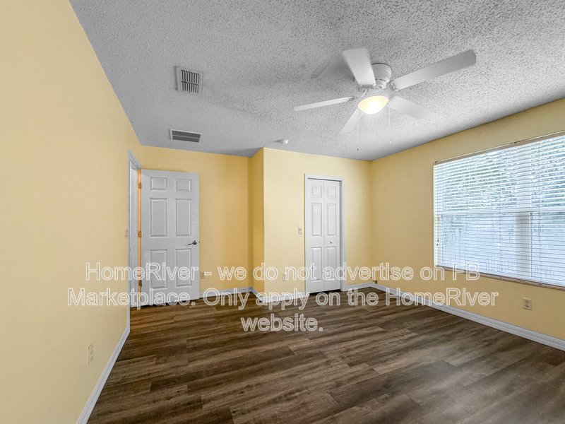 Townhome with a garage property image