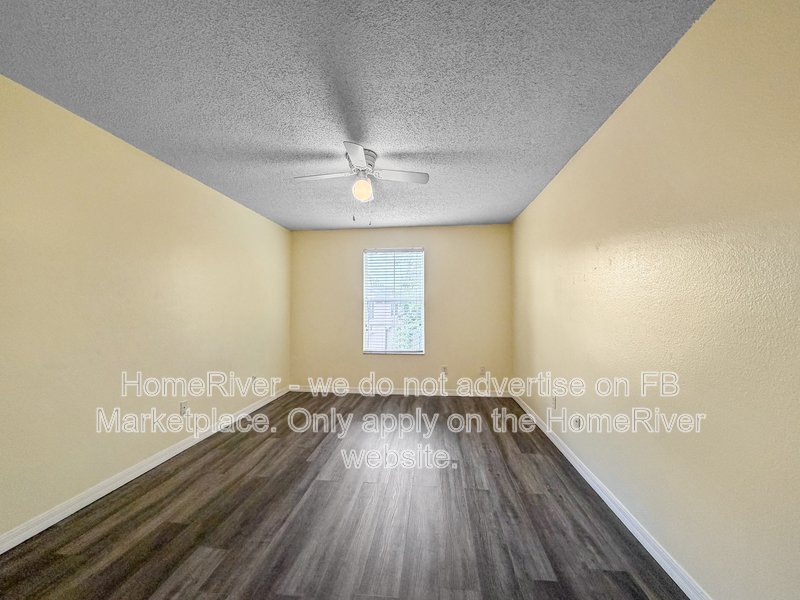Townhome with a garage property image