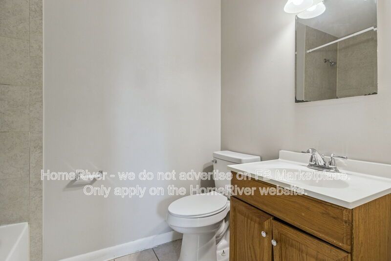 4 bedroom home with fenced yard property image