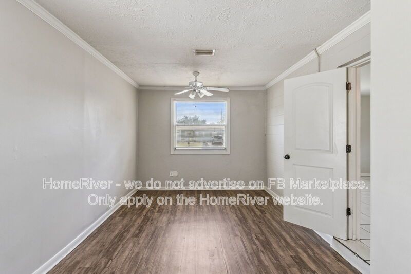 4 bedroom home with fenced yard property image