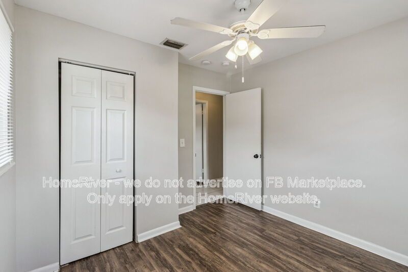 4 bedroom home with fenced yard property image