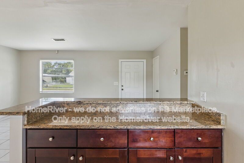 4 bedroom home with fenced yard property image